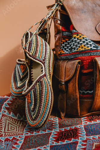 wicker shoes and leather backpack a Moroccan style