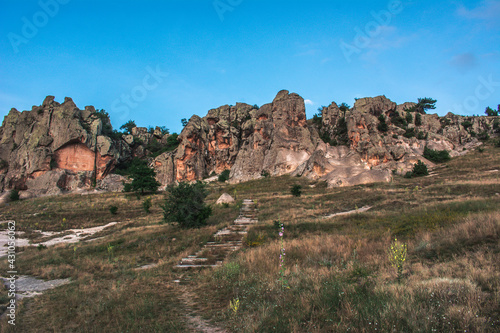 The wonderful geography of Phrygia. City of the Phrygians. Rocks, steppe and mountains. View of the Phrygian valley. Rock houses in the ancient city.