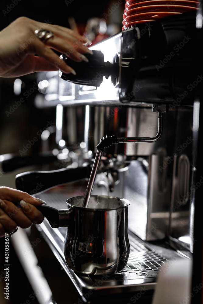 Close-up of professional coffee machine. Pouring espresso. Barista preparing deliciouse fresh hot coffee Close-up of professional coffee machine. Pouring espresso. Barista preparing deliciouse fresh hot coffee