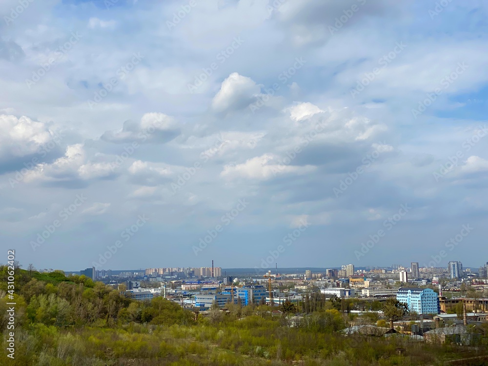 Kiev city Ukraine, urban cityscape. Scenic city over spectacular cloudy sky at spring season. 