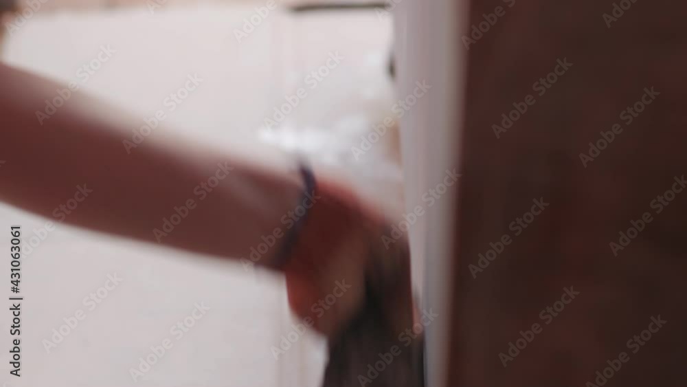 Sandpaper furniture processing closeup unrecognizable woman restoration of the old cupboard Sandpaper furniture processing closeup unrecognizable woman restoration of the old cupboard