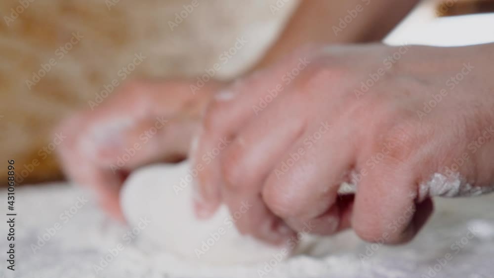 Applying flour on dough. Traditional national bread recipe. Applying flour on dough. Traditional national bread recipe.