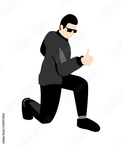 man in black jacket, black pants and black sneakers showing thumbs up squatting