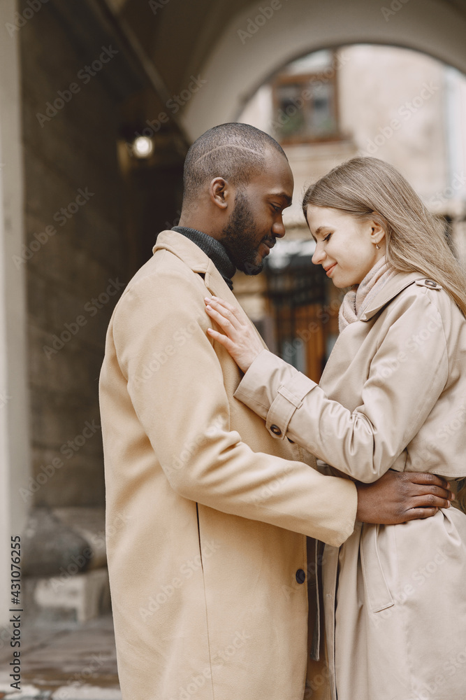 Mixed couple spenting time together in a spring city Mixed couple spenting time together in a spring city