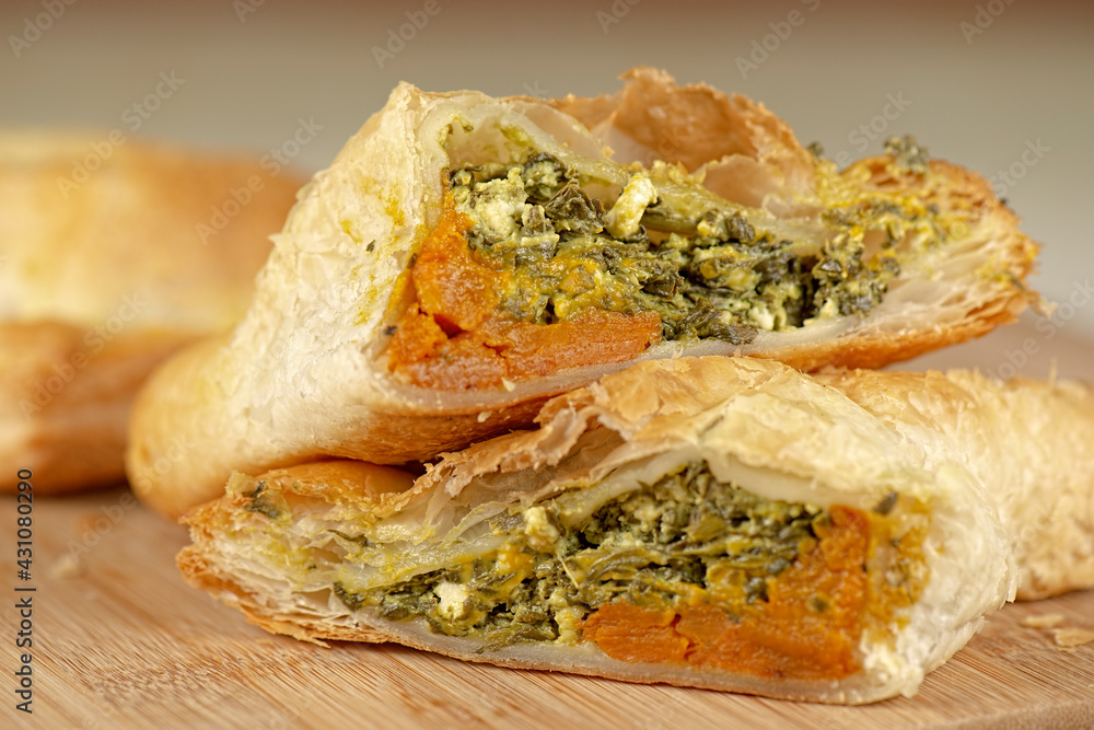 Freshly baked spinach triangle pastry with danish feta and roasted pumpkin. Freshly baked spinach triangle pastry with danish feta and roasted pumpkin.
