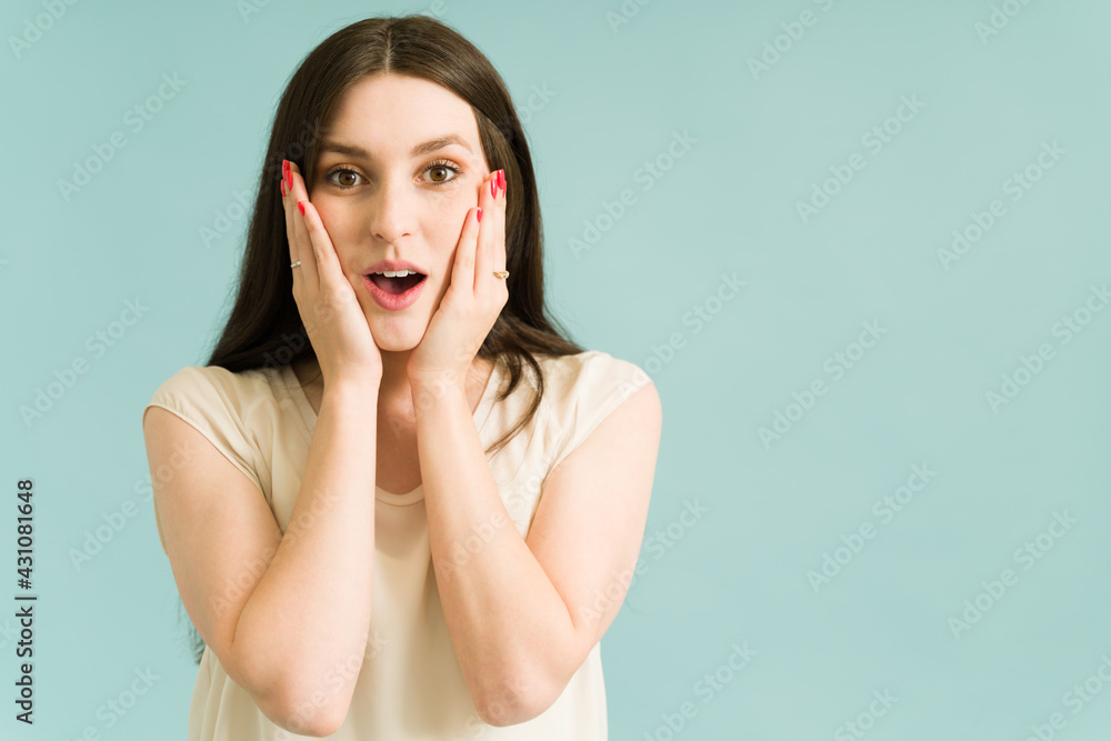 Thrilled woman screaming with happiness Thrilled woman screaming with happiness