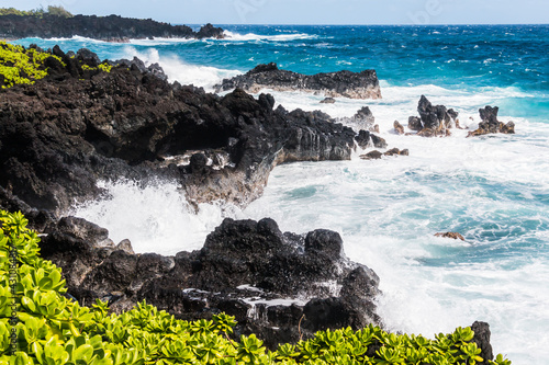 Waves Crash Against Rugged Lava Coastline Near Kauiau Point, Waianapanapa State Park, Maui, Hawaii, USA photo