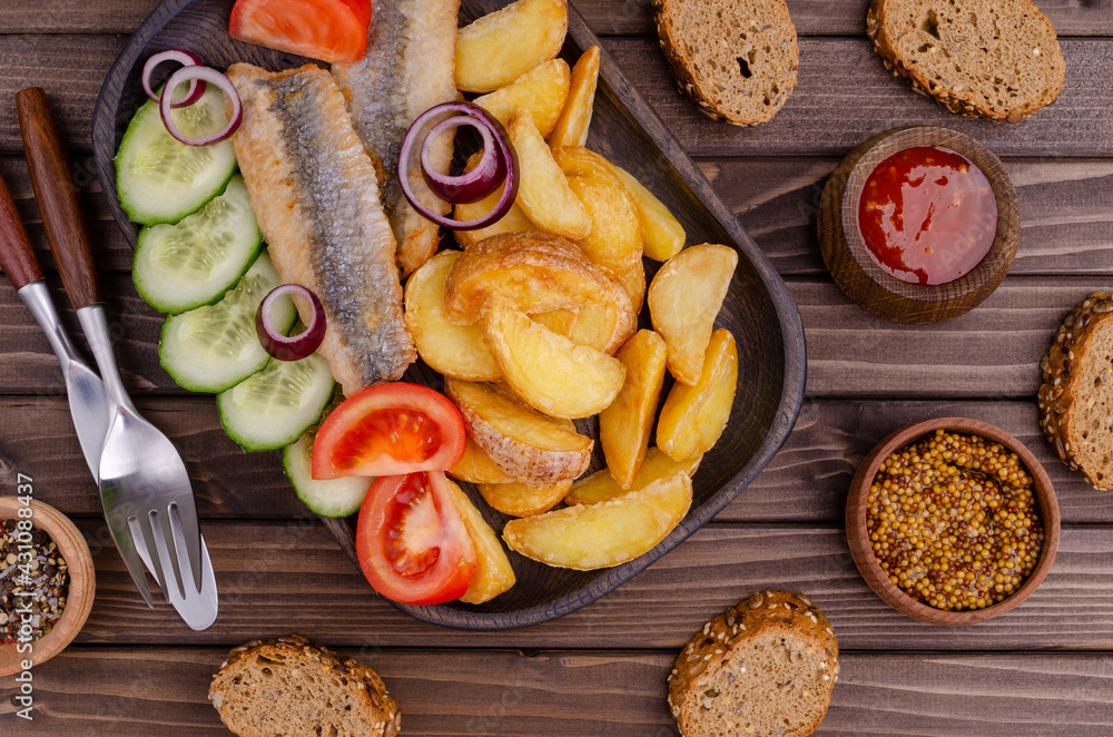 Fish fillet with fried potatoes Fish fillet with fried potatoes