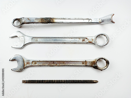 Set of old rusty tools worker isolated on white background. © Peeraya