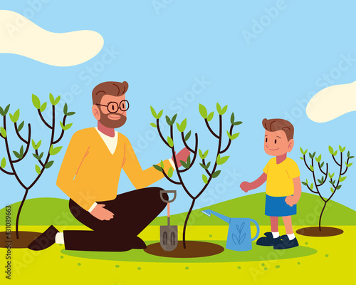 dad and son planting a tree