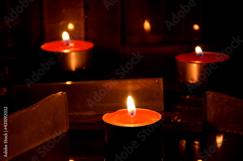 Flame of fires from candle can and reflection © athapet
