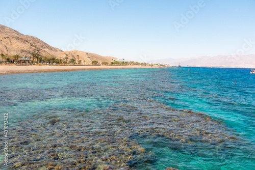 A view of the coral reef above the water. The Red Sea. Beach in the city of Eilat, Israel High angel. High quality photo