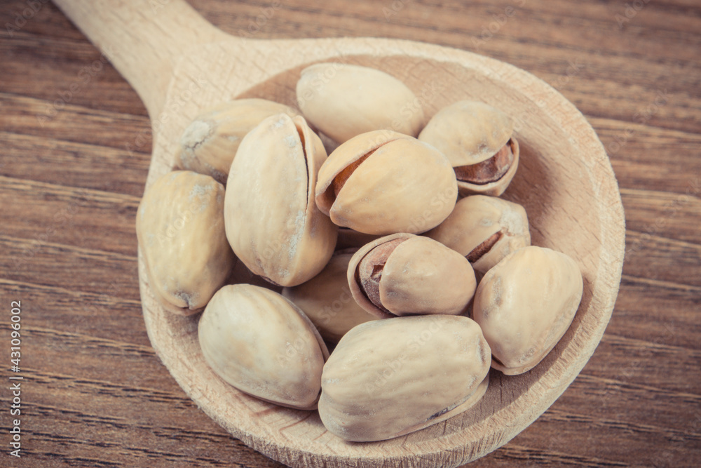 Fototapeta premium Pistachio nuts containing vitamins and minerals. Healthy eating