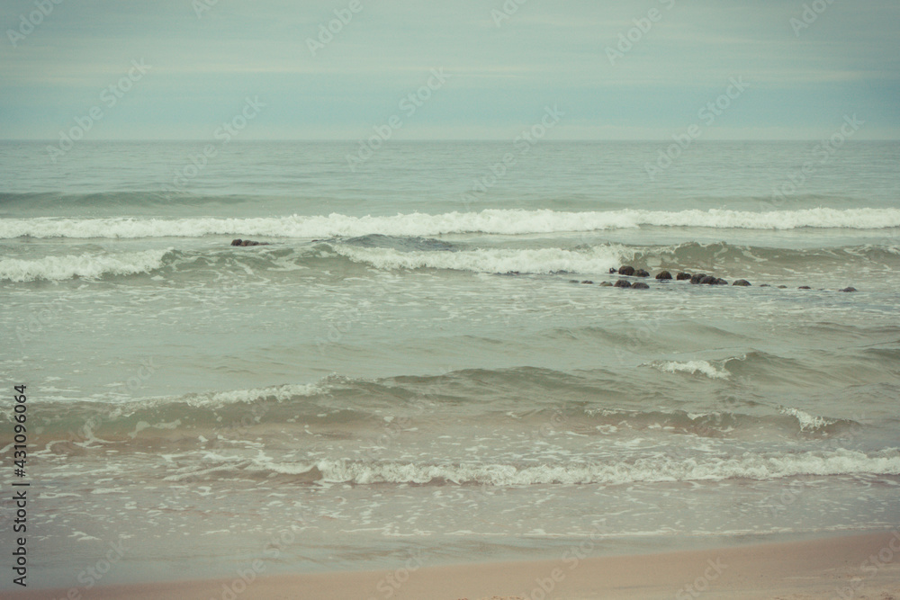 View on beach and sea with waves. Travel concept. Summertime View on beach and sea with waves. Travel concept. Summertime