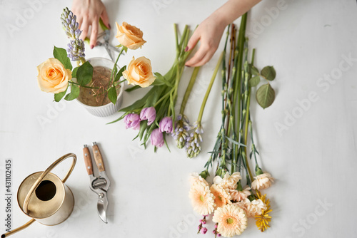 top view. Step by step installation of flowers in a vase. Flowers bunch, set for home. Fresh cut flowers for decoration home. European floral shop. Delivery fresh cut flower. photo