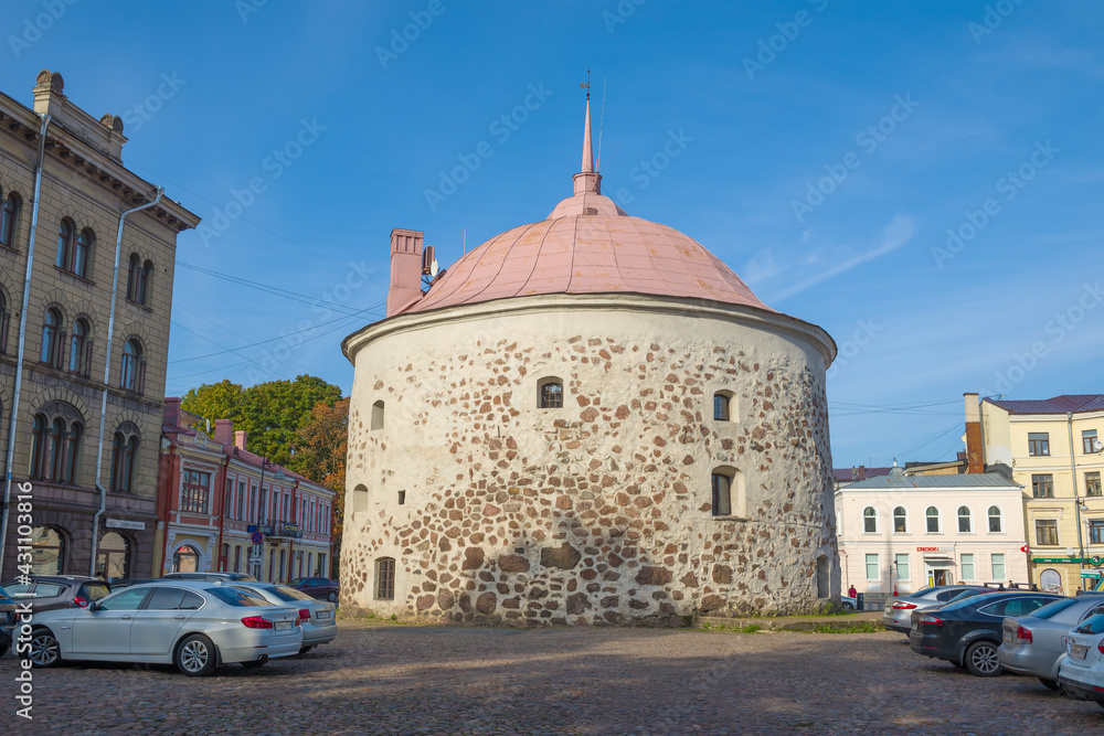 Fototapeta premium The old Round tower on the Market Square close-up on a October afternoon, Vyborg