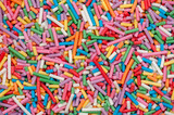 Sugar sprinkles, decorations for cake and pastry, a lot of sprinkles as a background 