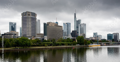 Skyline of Frankfurt city the business centre of Germany with skyscrapers and the river Rhine
