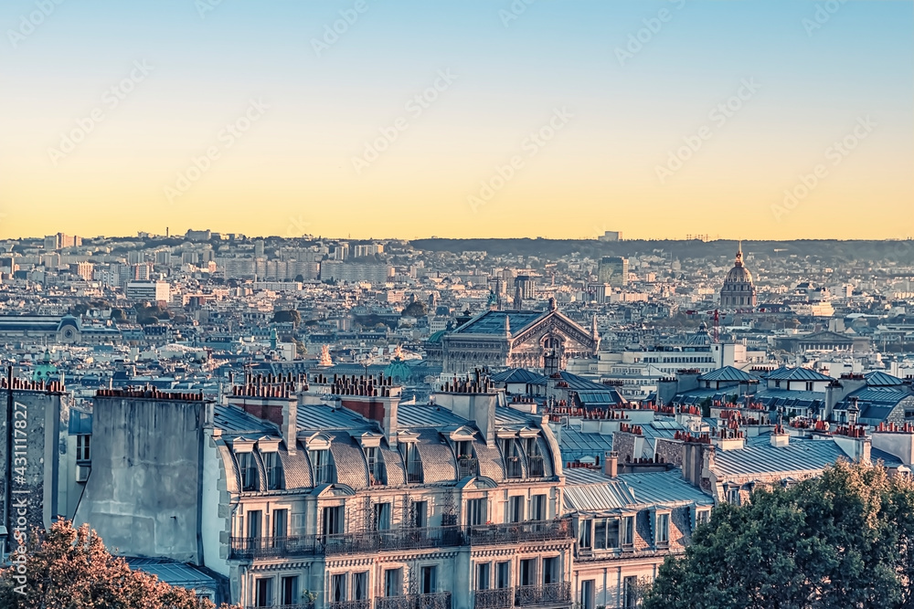 Paris city roofs in the evening