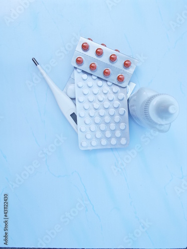 pills and thermometer