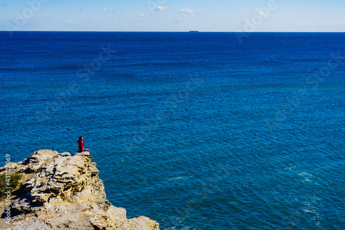 Tourist woman on sea cliffs in Spain © anetlanda