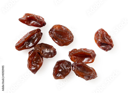 Raisins placed on a white background.