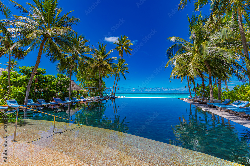 Tropical swimming pool. Luxury infinity pool under palm trees with sea horizon view. Summer travel vacation landscape, luxurious hotel resort. Stunning island landscape, paradise beach, exotic nature