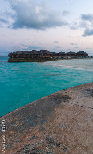 Shot of a over water bungalows on tropical island. Holiday