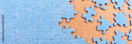 Panoramic image jigsaw puzzle with copy space. Connected and missing blank puzzle pieces. Business strategy Teamwork and problem solving concept