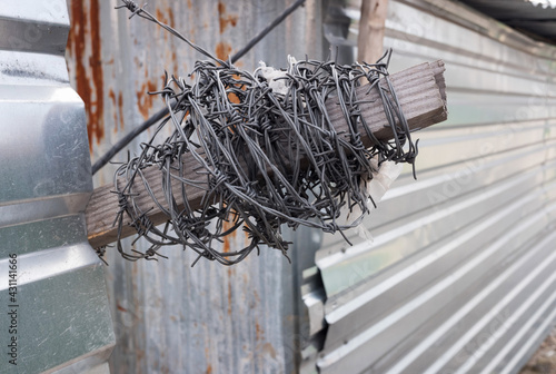 Barbed wire. Construction site fencing