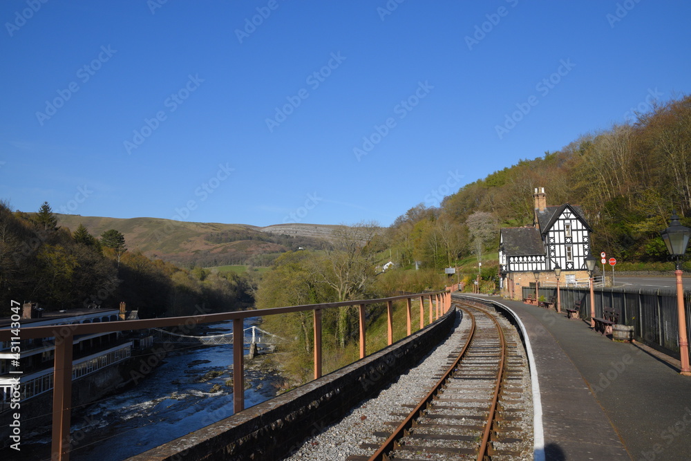 Fototapeta premium looking down the rail track from Berwyn station towards Llangollen in the welsh countryside
