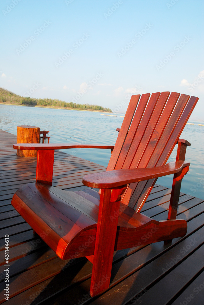 Brown Wooden chair over the lake - Chilling vibe on riverside - Relax time 