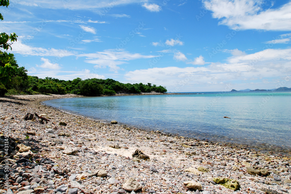 koh kham beach and many stone on the beach with clear blue sea and blue sky in koh kham island at Sattahip Chonburi thailand - Seascape scenic travel destination koh kham beach and many stone on the beach with clear blue sea and blue sky in koh kham island at Sattahip Chonburi thailand - Seascape scenic travel destination