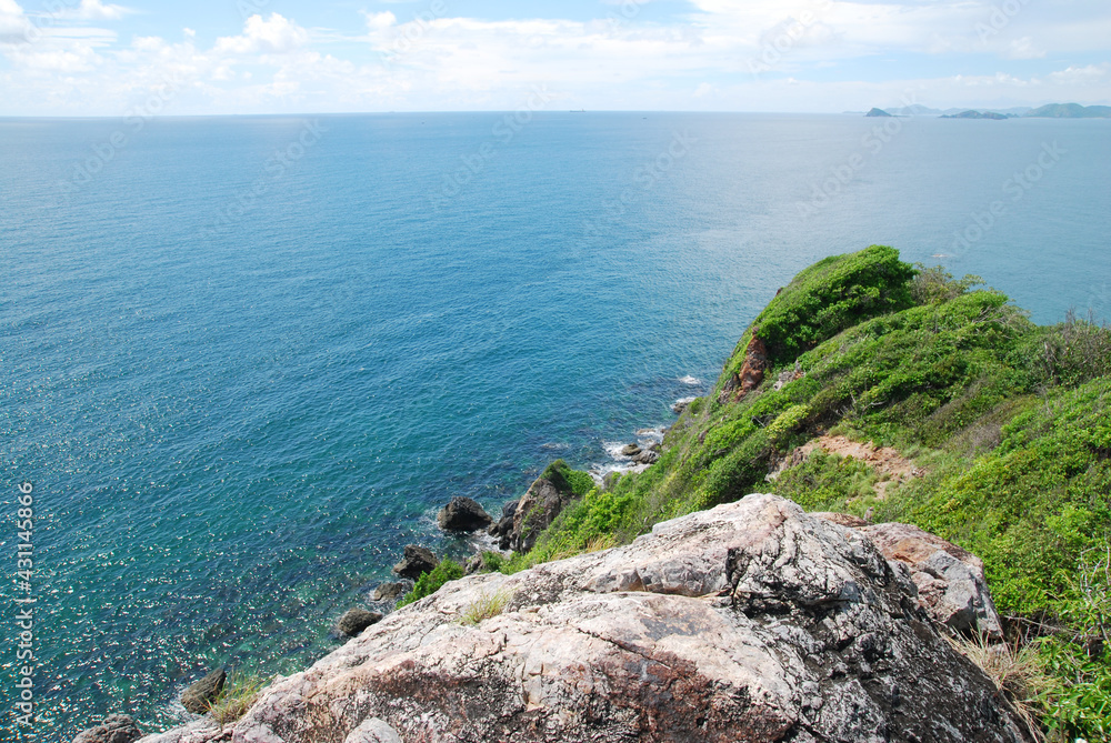 Nature view of seascape clearly blue sea and Limestone hill on the sea summer season at koh kham beach chonburi thailand Nature view of seascape clearly blue sea and Limestone hill on the sea summer season at koh kham beach chonburi thailand