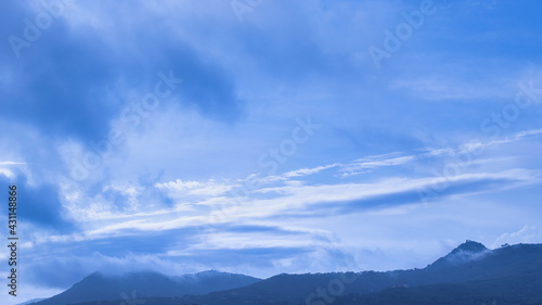 mountains with big blue cloud sky
