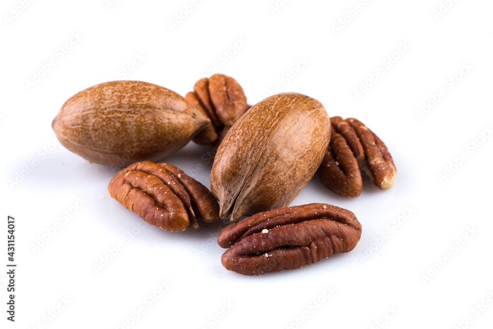Few pecan nuts isolated on white Few pecan nuts isolated on white