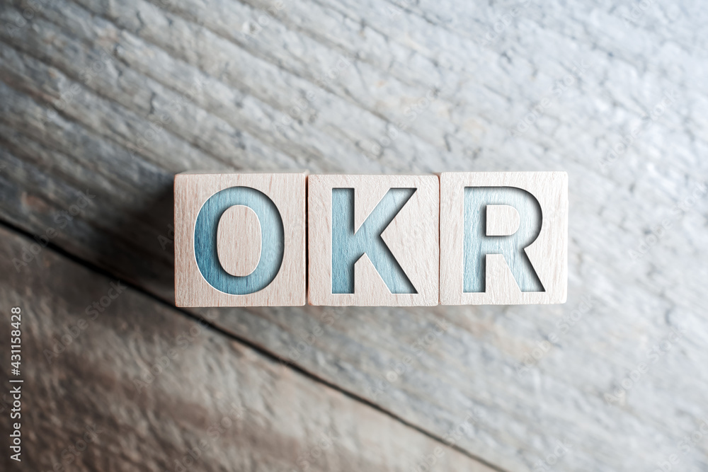 OKR Written On Wooden Blocks On A Board OKR Written On Wooden Blocks On A Board