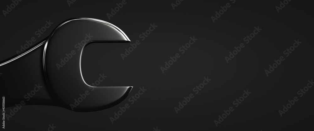 Fototapeta premium A clipped wrench. Dark background. Technical topics