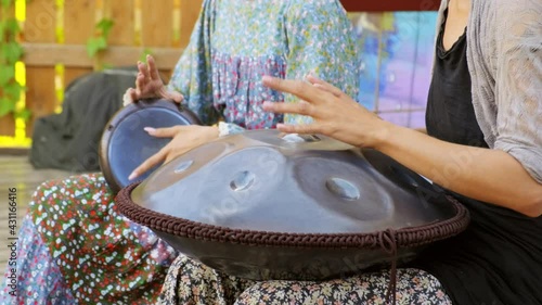 Open air concert. Musicians play glucophone and drum photo