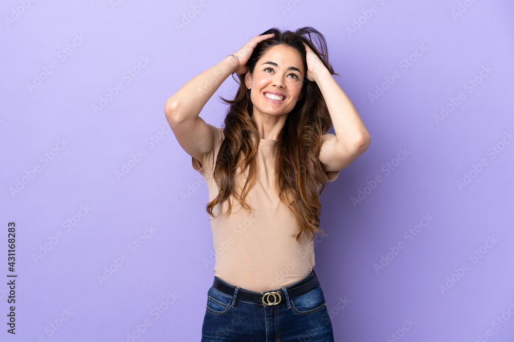 Woman over isolated purple background laughing Woman over isolated purple background laughing