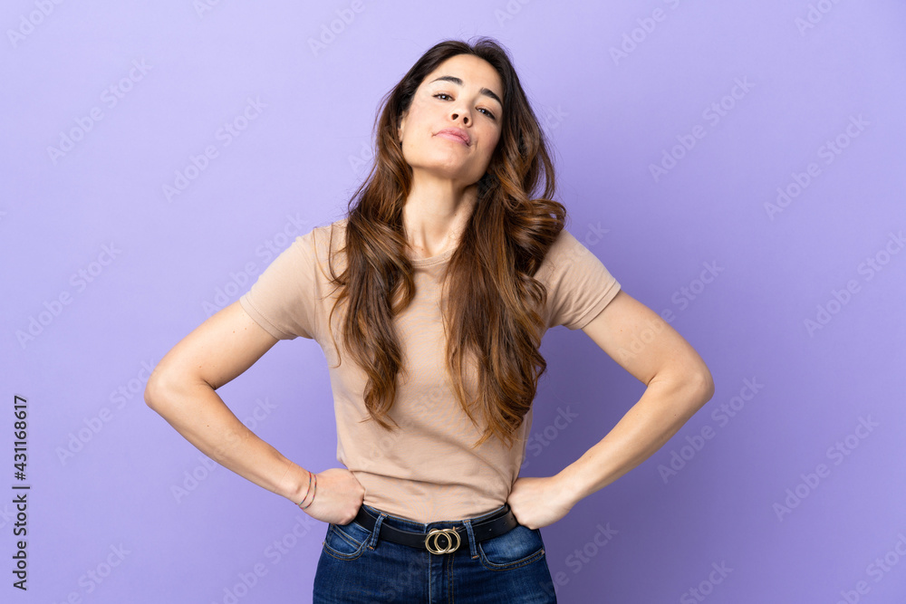 Woman over isolated purple background angry Woman over isolated purple background angry