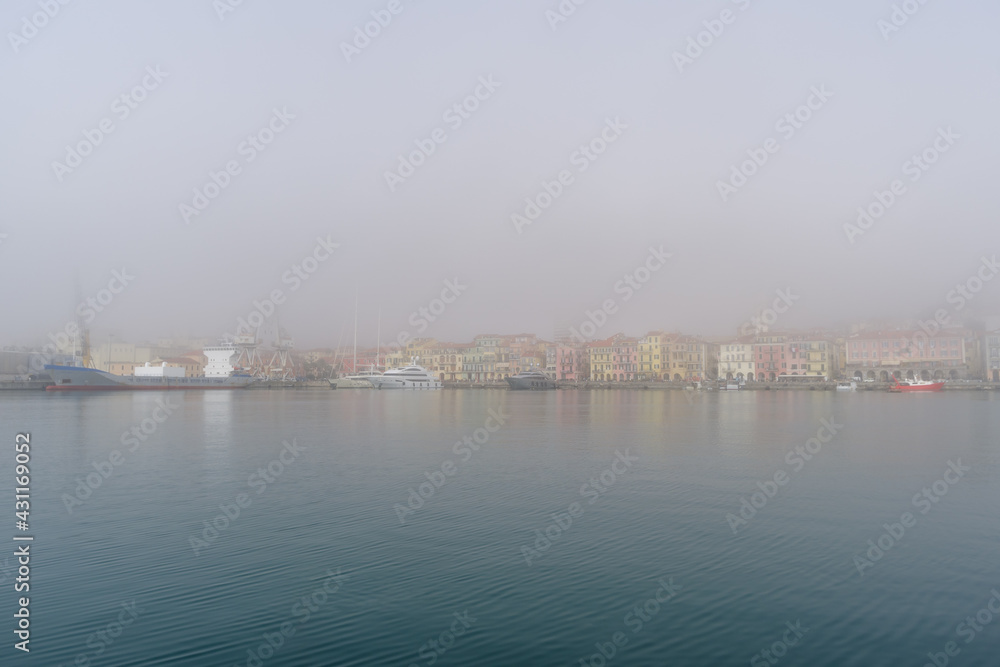 Morning fog over Imperia coastal city, Italian Riviera