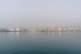 Morning fog over Imperia coastal city, Italian Riviera