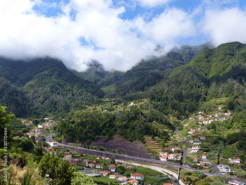 Top view of the village Sao Vicente in Madeira, surrounded by mountains. 