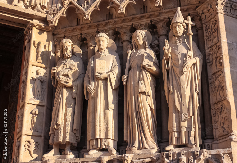 Statues on the wall of Notre Dame cathedral, Paris