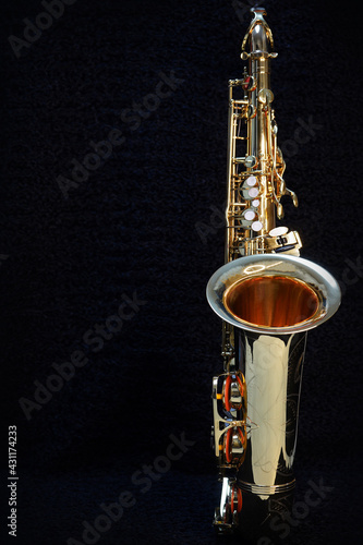 Saxophone jazz instruments. Alto sax isolated. Saxophone music instrument closeup on black                               