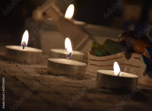 romantic tealights, candles  in a dim floor