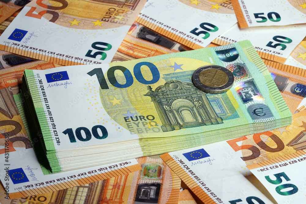 Dollar closeup. Money macro. A stack of cash in a silver clip. European currency. Money background Dollar closeup. Money macro. A stack of cash in a silver clip. European currency. Money background
