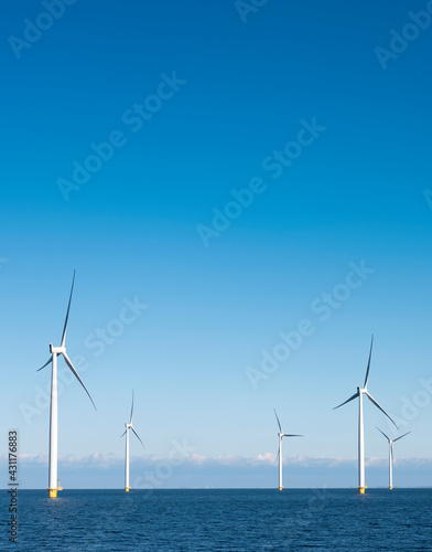 wind turbines in water of ijsselmeer near Urk in dutch part of noordoostpolder