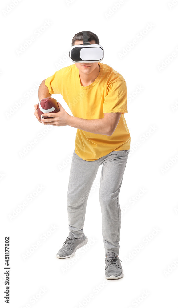 Sporty young man with virtual reality glasses playing American football on white background Sporty young man with virtual reality glasses playing American football on white background